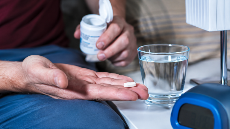 Person remaining awake after taking zopiclone, illustrating what happens if you take zopiclone and stay awake and its potential side effects